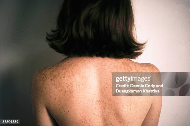 freckles on the back of a woman - freckle stock pictures, royalty-free photos & images