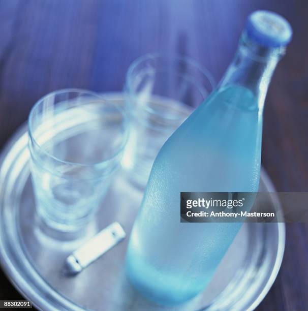 bottle of water on tray - anthony masterson stock-fotos und bilder