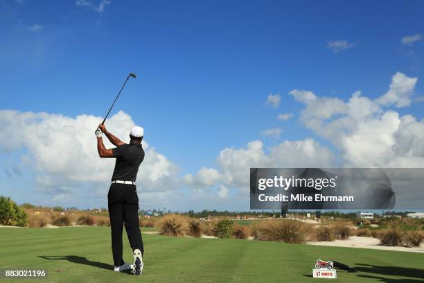 Tiger Woods of the United States plays his shot from the eighth tee during the first round of the Hero World Challenge at Albany, Bahamas on November...