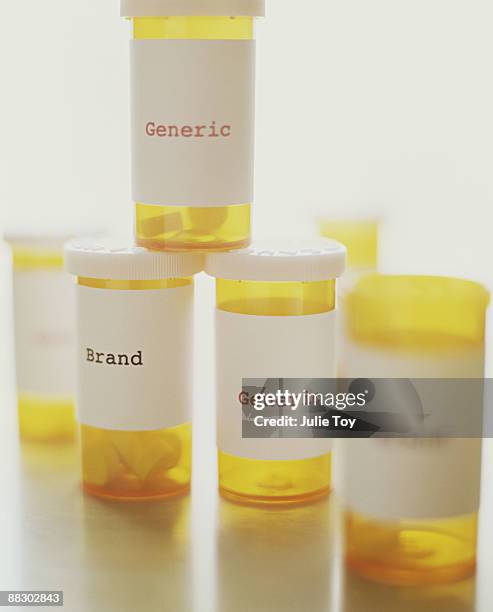 prescription medicine bottles - generic drug stock pictures, royalty-free photos & images