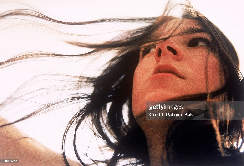 Woman with blowing hair