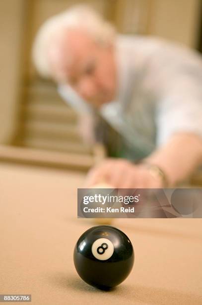 man playing pool - 8 ball pool stock pictures, royalty-free photos & images