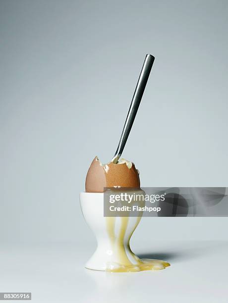 spoon in soft-boiled egg - crack spoon stock pictures, royalty-free photos & images