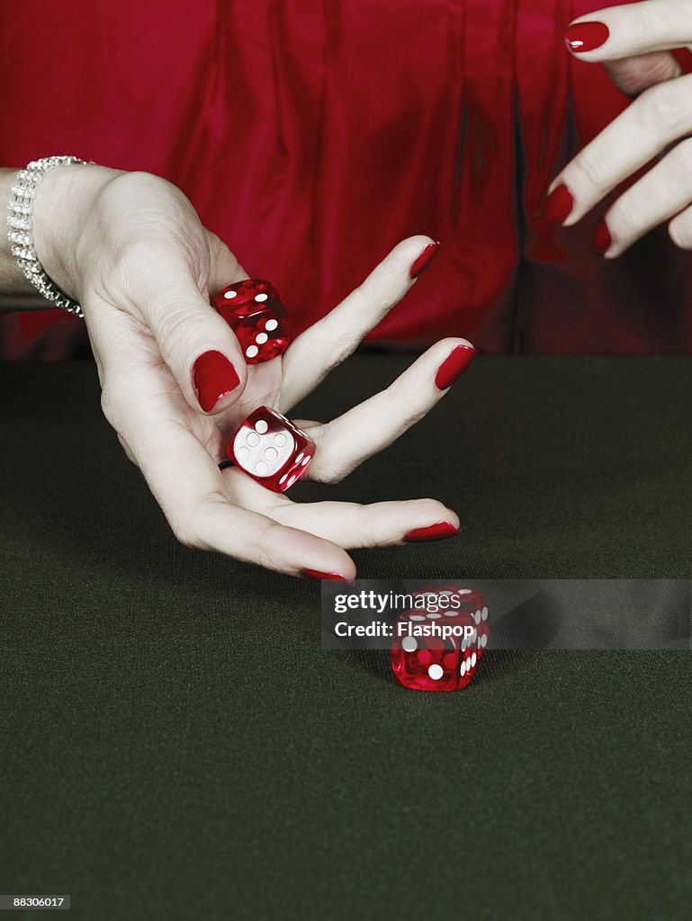 Woman rolling dice