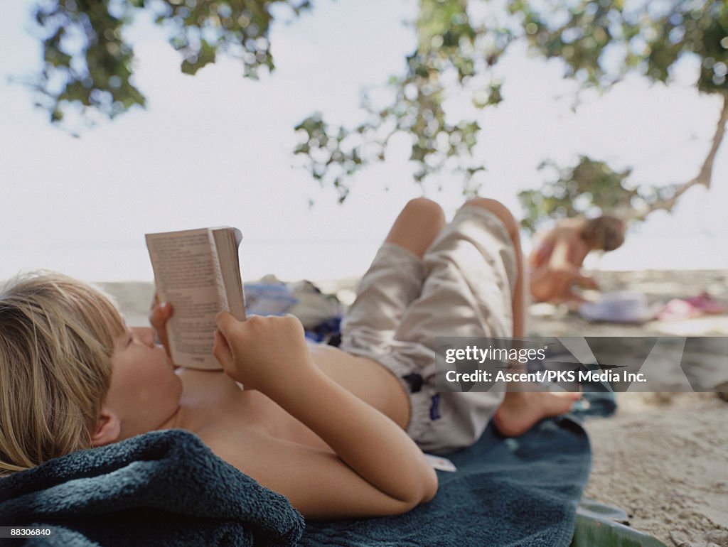 Boy reading book