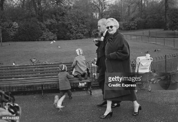 Clementine Churchill and her son Randolph walking in a park in London, UK, 23rd November 1960.