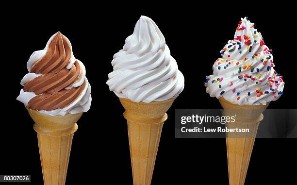 soft serve ice cream cones - chocolate swirls foto e immagini stock