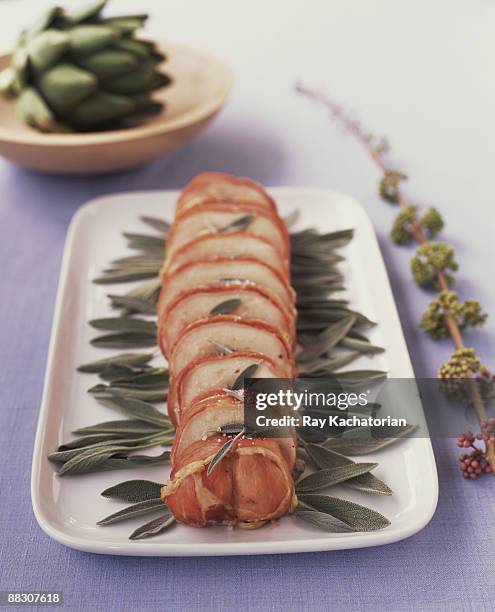 prosciutto wrapped pork tenderloin with sage - prosciutto wrapped stock pictures, royalty-free photos & images