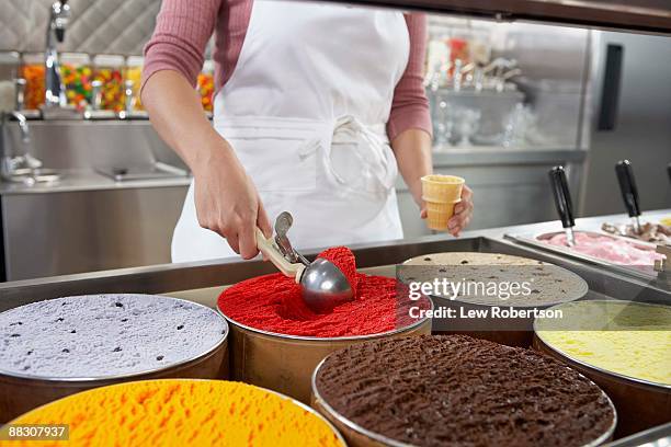 person scooping ice cream - ice cream parlour stock pictures, royalty-free photos & images