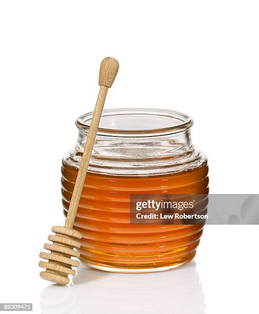 honey jar and dipper - honey stock pictures, royalty-free photos & images
