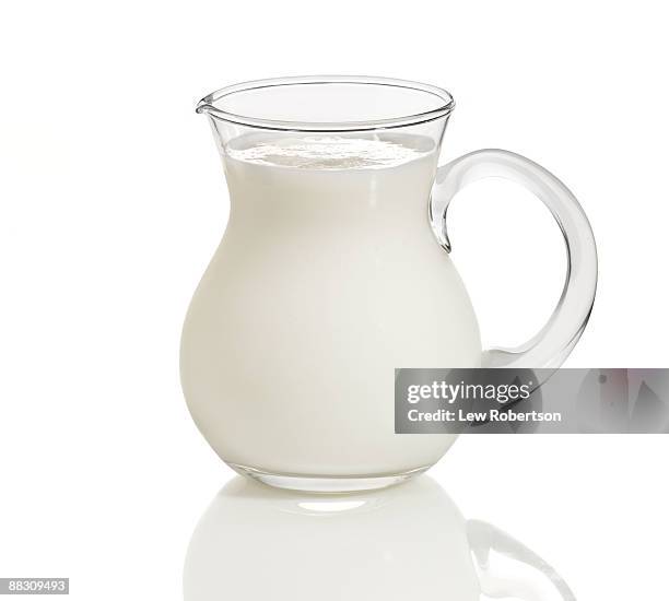 pitcher of buttermilk - henkelkrug stock-fotos und bilder