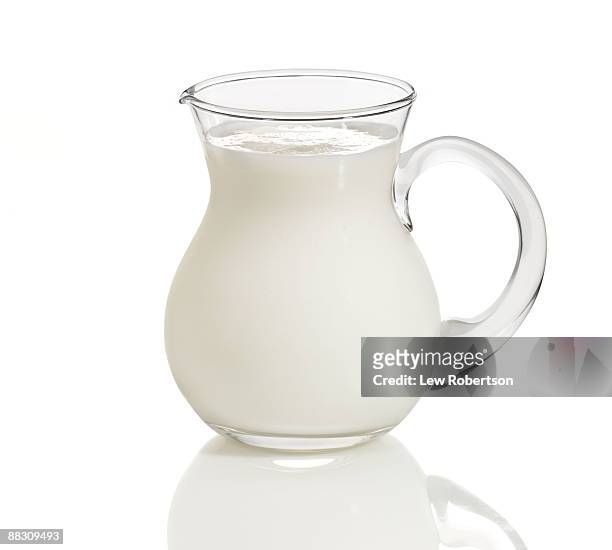 pitcher of buttermilk - jug stockfoto's en -beelden