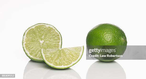 limes still life - limes stock pictures, royalty-free photos & images