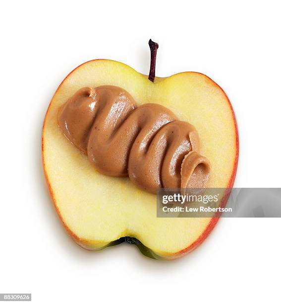 apple slice with peanut butter - peanut butter stock pictures, royalty-free photos & images