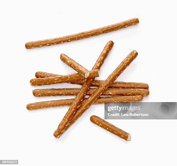 pretzel sticks on white - pretzel stock pictures, royalty-free photos & images