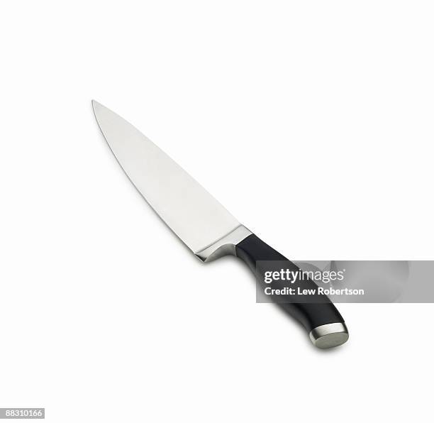 chefs knife with black handle - küchenmesser freisteller stock-fotos und bilder