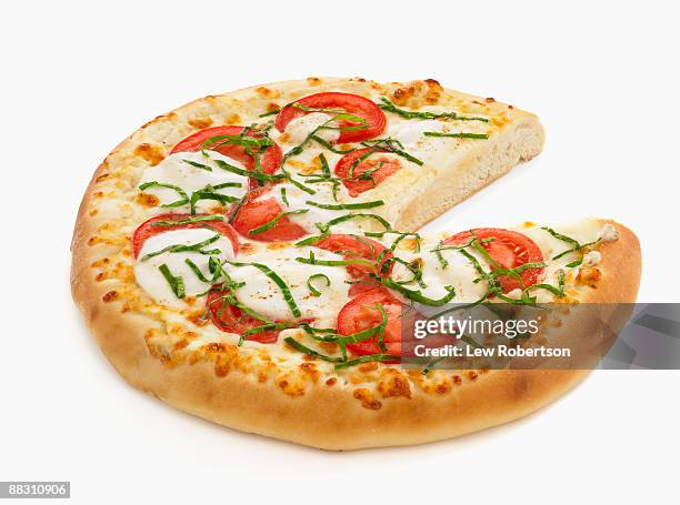 tomato basil pizza with a missing slice - preparación de alimentos fotografías e imágenes de stock