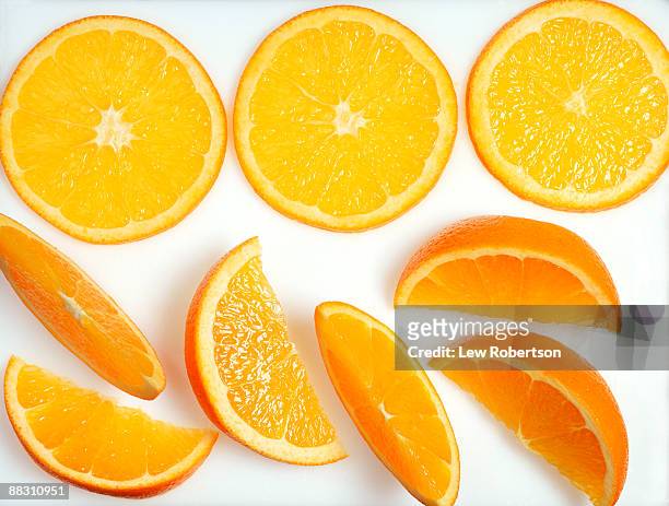 orange slices - orange stock pictures, royalty-free photos & images