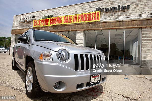 Jeep sits in front of the empty showroom at Premier Chrysler June 8, 2009 in Chicago, Illinois. The dealership is 1 of the 789 Chrysler dealerships...