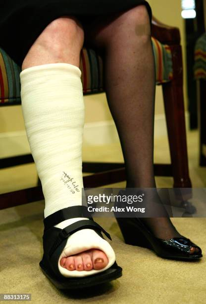 Supreme Court nominee and Federal Appeals Court judge Sonia Sotomayor wears a cast on her right foot with a signature of Sen. Mary Landrieu during a...