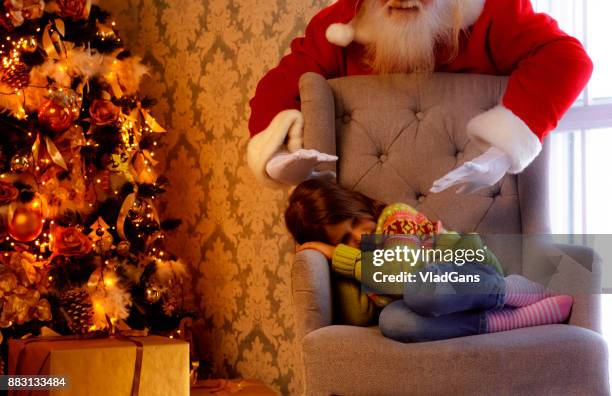 santa claus gives presents - girl sitting with legs open stock pictures, royalty-free photos & images