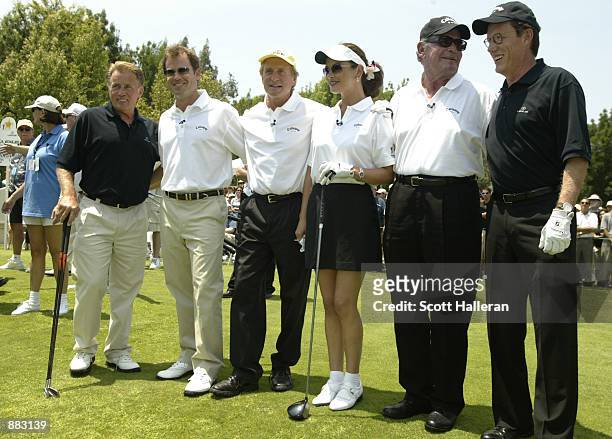 Actors Martin Sheen, Greg Kinnear, Michael Douglas, Catherine Zeta-Jones, James Garner and James Woods pose for the media during the hole-in shootout...