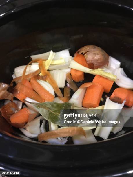 making beef bone broth - bone broth stock pictures, royalty-free photos & images