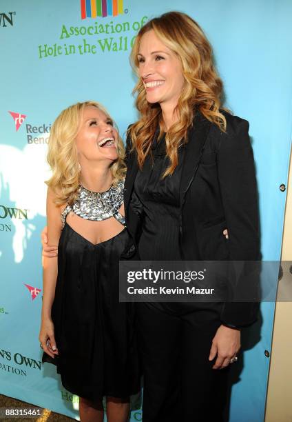 Kristin Chenoweth and Julia Roberts attend the celebration of Paul Newman's Hole in the Wall Camps at Avery Fisher Hall at Lincoln Center for the...