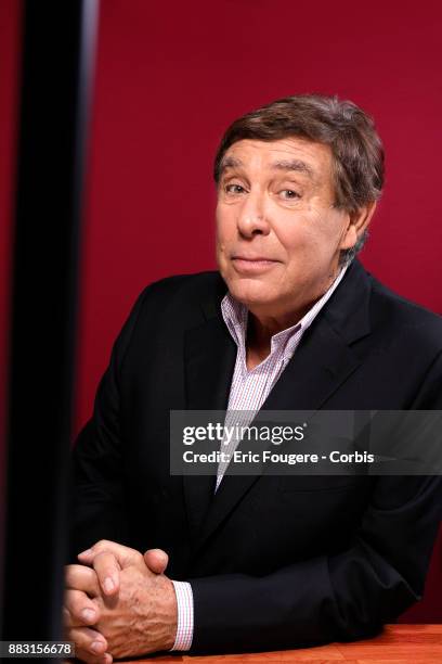 Presenter Jean-Pierre Foucault poses during a portrait session in Paris, France on .