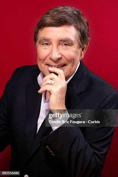 Presenter Jean-Pierre Foucault poses during a portrait session in Paris, France on .