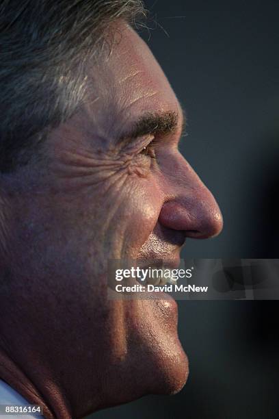 Director Robert Mueller speaks at a news conference where he presented actor Efrem Zimbalist Jr. With a badge as an honorary special agent, the...