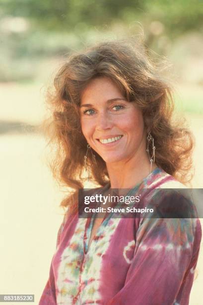 Portrait of actress Jane Fonda in a tie-dyed shirt, Santa Barbara, California, 1980s.