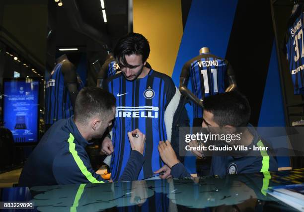 Milan Skriniar and Matias Vecino of FC Internazionale attend at Inter Store on November 30, 2017 in Milan, Italy.