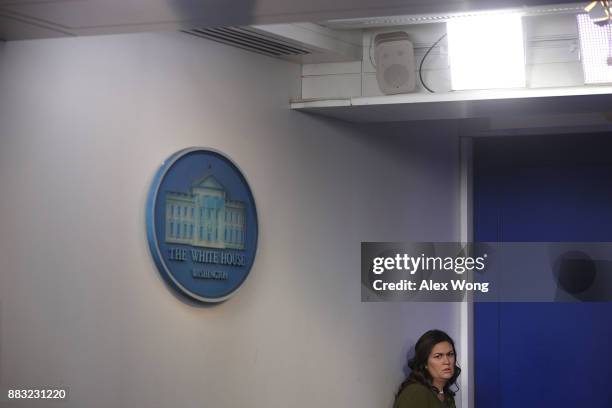 White House Press Secretary Sarah Huckabee Sanders waits for her turn to speak during a daily news briefing at the James Brady Press Briefing Room of...