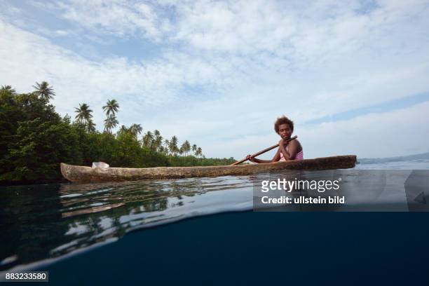Local People in typical Dugout Canoe, Florida Islands, Solomon Islands