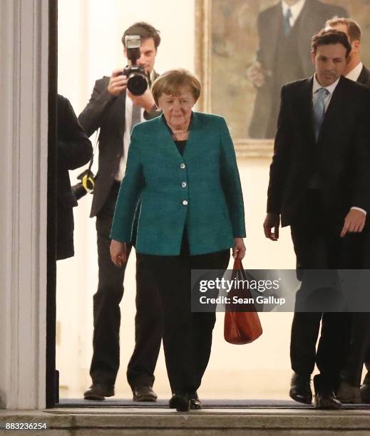 German Chancellor and leader of the German Christian Democrats Angela Merkel departs after a meeting of the CDU, the Bavarian Christian Democrats and...