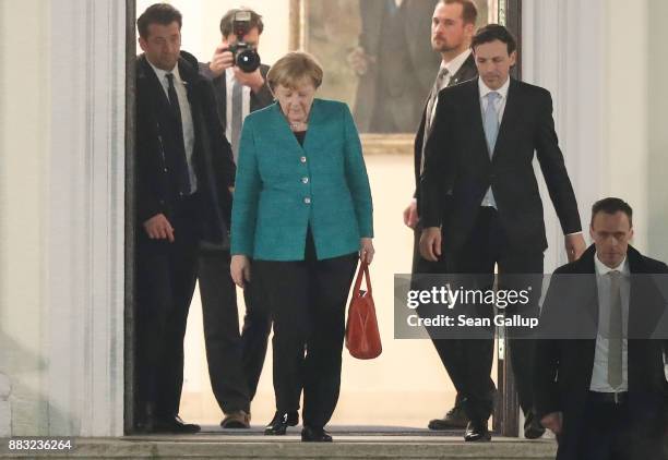 German Chancellor and leader of the German Christian Democrats Angela Merkel departs after a meeting of the CDU, the Bavarian Christian Democrats and...