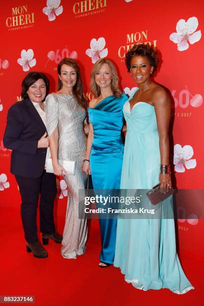 Vera Int-Veen, Sabrina Staubitz, Nicole Noevers and Arabella Kiesbauer attend the Mon Cheri Barbara Tag 2017 at Postpalast on November 30, 2017 in...