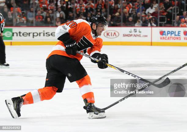 Danick Martel of the Philadelphia Flyers takes a slapshot against the New York Islanders on November 24, 2017 at the Wells Fargo Center in...
