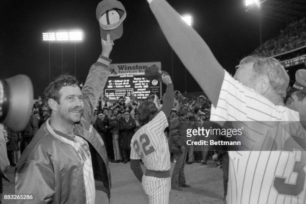 Brewers' pitcher Mike Caldwell takes a bow after winning his second World Series game against St. Louis. At right is teammate Charlie Moore.