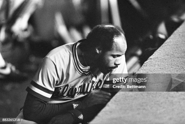 Milwaukee Brewer first baseman Cooper sits dejected in the Milwaukee dugout at the end of the final World Series game. St. Louis defeated Milwaukee...