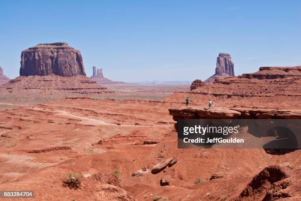 visitors at john ford's point - kayenta region stock pictures, royalty-free photos & images