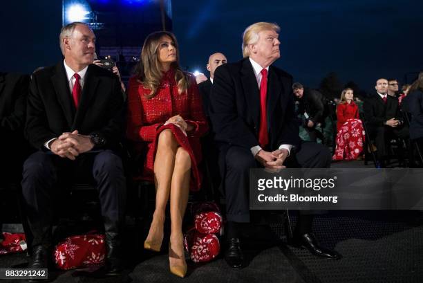 President Donald Trump, from right, U.S. First Lady Melania Trump, and Ryan Zinke, U.S. Secretary of interior, sit during the 95th Annual National...