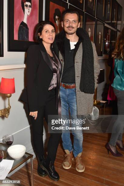 Sadie Frost and Matthew Williamson attend a private view of artist Rebecca Leigh's exhibition hosted by Sadie Frost at Tann Rokka on November 30,...
