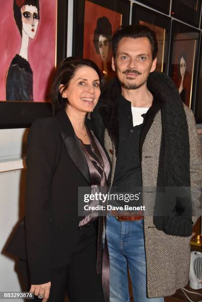 Sadie Frost and Matthew Williamson attend a private view of artist Rebecca Leigh's exhibition hosted by Sadie Frost at Tann Rokka on November 30,...