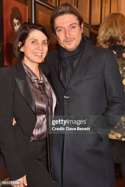 Sadie Frost and Darren Strowger attend a private view of artist Rebecca Leigh's exhibition hosted by Sadie Frost at Tann Rokka on November 30, 2017...