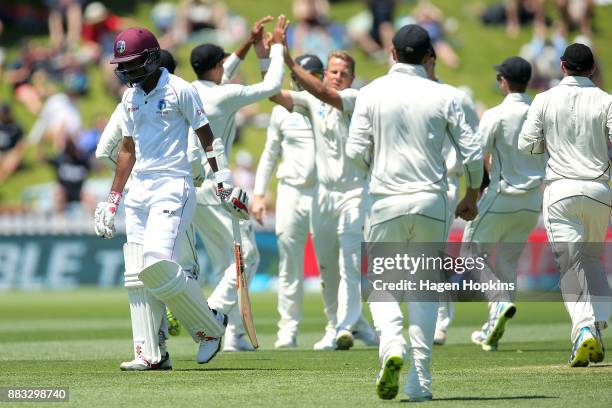 Neil Wagner of New Zealand celebrates after taking the wicket of Kraigg Brathwaite of the West Indies during day one of the Test match series between...