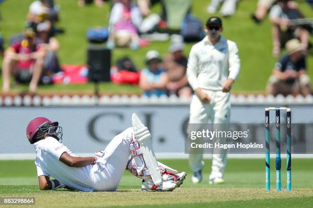 Kraigg Brathwaite of the West Indies reacts after being struck by a delivery during day one of the Test match series between the New Zealand...