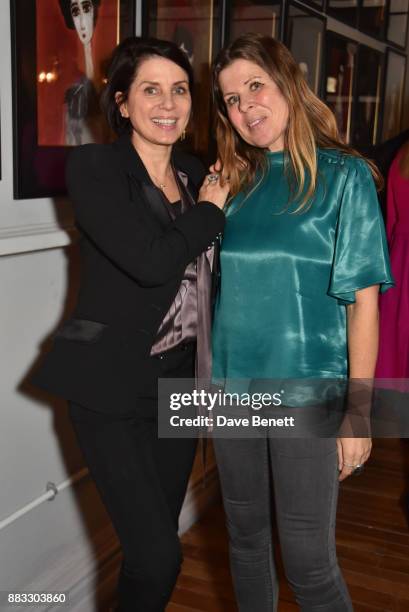Sadie Frost and Rebecca Leigh attend a private view of artist Rebecca Leigh's exhibition hosted by Sadie Frost at Tann Rokka on November 30, 2017 in...