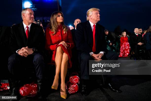 President Donald Trump , first lady Melania Trump and Interior Secretary Ryan Zinke participate in the 95th annual national Christmas tree lighting...
